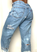 Load image into Gallery viewer, This product is an upcycled denim featuring hand distressed and hand dipped detailing. Can be styled to be over-sized or fitting, depending on the muse.